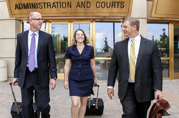 Peak Legal attorneys in front of courthouse